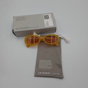 LE SUSTAIN (LE SPECS) SLIM OVAL ‘OUTTA TRASH’ SUNGLASSES IN MUSTARD